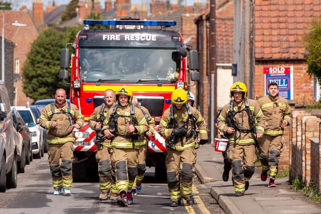 Firefighters and managers from Lincolnshire Fire and Rescue came together at last weekend to complete a seven-mile charity challenge. Picture: John Aron Photography.