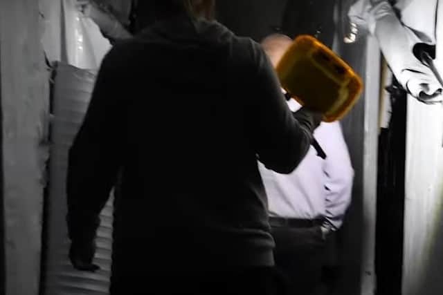 Forensic officers on the scene of the cannabis haul