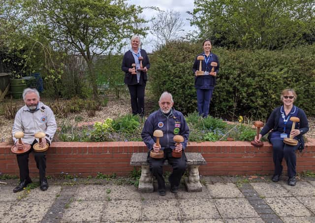 The Lincolnshire Association of Woodturners, based at Leasingham, has lent a hand to St Barnabas Hospice and its Wig Bank service.