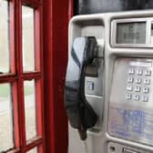 BT want to remove a pay phone in Boston