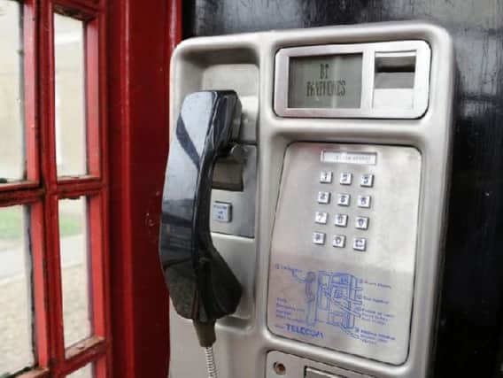 BT want to remove a pay phone in Boston