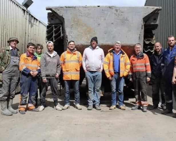 Daniel Abbott (centre) with some of the many volunteers in the project.