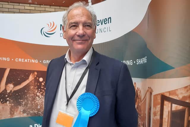 Andrew Hagues, Conservative, held Sleaford Rural. EMN-210705-181207001