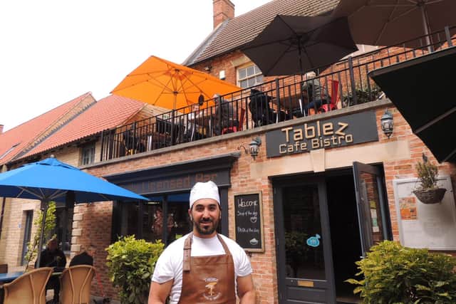 Mesut Palabiyik proud of his new look Tablez bistro, with roof terrace. EMN-210517-171808001