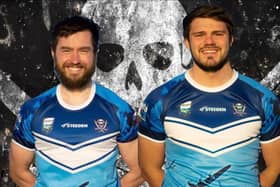 Captain John Stanfield and vice-captain Lew Wilson in the charity shirt.
