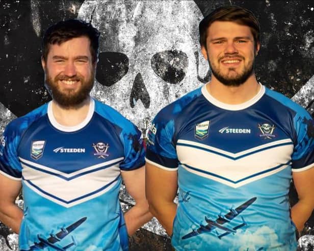 Captain John Stanfield and vice-captain Lew Wilson in the charity shirt.