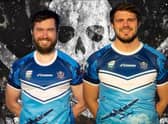 Captain John Stanfield and vice-captain Lew Wilson in the charity shirt.