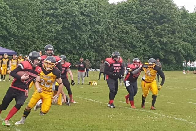 The under 19s in action.