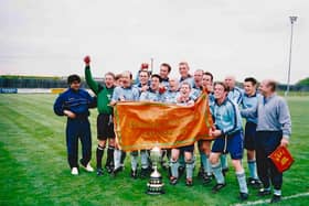 They did it! The Poachers celebrate. Photo: Andy Sandall