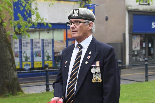 Royal British Legion wreath laying at Boston Menmorial. Karl Bates (vice chairman) laying the RBL wreath.