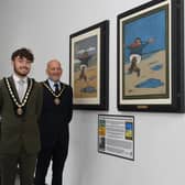 The unveiling of the original paintings of the Jolly Fisherman by Mayor of Skegness Coun John Byford, with Mayoress Jane Byford and Deputy Mayor Coun Billy Brookes.