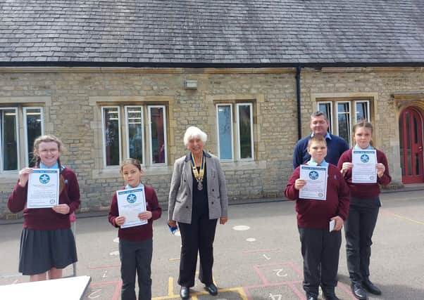 Rotary Star Awards at William Alvey School from Sleaford Rotary president Barbara Roberts, with pupils Zak, Imogen, Sophie and Lilley. EMN-210519-160217001