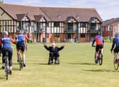 A scene from a recent bicycle 'flypast' for Squadron Leader George 'Johnny' Johnson.