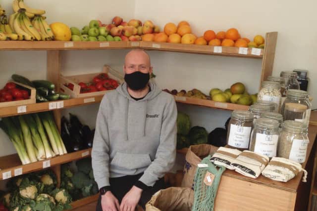 Michael pictured with the fresh fruit and vegetables, plus dried herbs. Picture: Lindi Taylor. EMN-210513-153948001