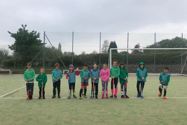 Youngsters at Louth Hockey Club bid farewell to their old playing surface at ther weekend before work began in laying the new pitch on Monday. Photo: David Dales