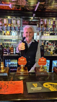 Singing legend Tony Christie, who Jan and Paul manage, pours one of the first pints at The Carps