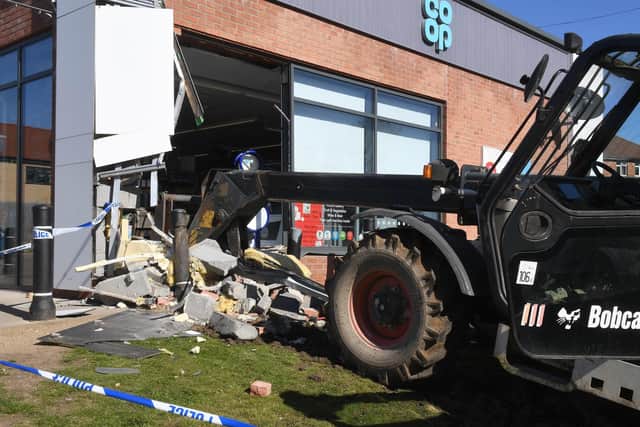 The corner of the store has been smashed in during the ram raid at Ancaster Co-op. EMN-210519-095411001