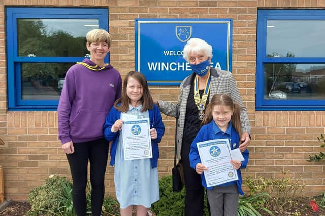 Rotary Club of Sleaford president Barbara Roberts with Winchelsea School headteacher Helen Duckett and award winning pupils Chloe and Isobel. EMN-210519-160408001