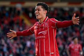 Brennan Johnson of Lincoln City celebrates after scoring their sides second goal. (Photo by Laurence Griffiths/Getty Images)