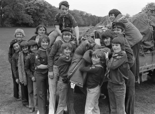 Cub Scouts of the 10th Boston (Butterwick and Freiston) pack unload their camping gear 45 years ago.