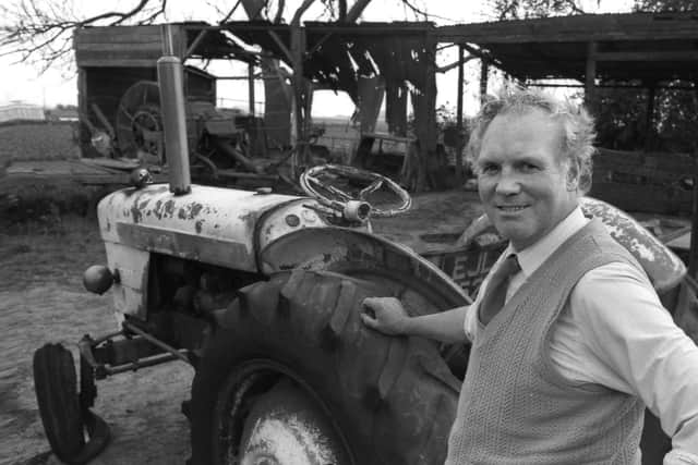 Fishtoft Farmer Roy Bolland and his 'self-drive' tractor pictured near the gutted shed.