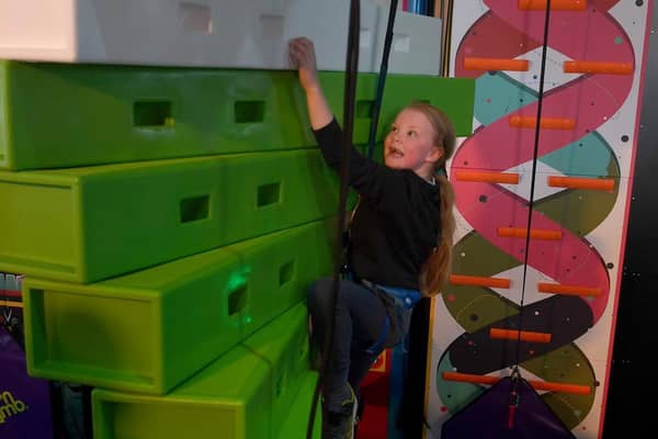 Sophia Roberts, 7, of Ingoldmells was thrilled to test out the Click 'n Climb. She used to have to travel to Lincoln for a climbing wall.