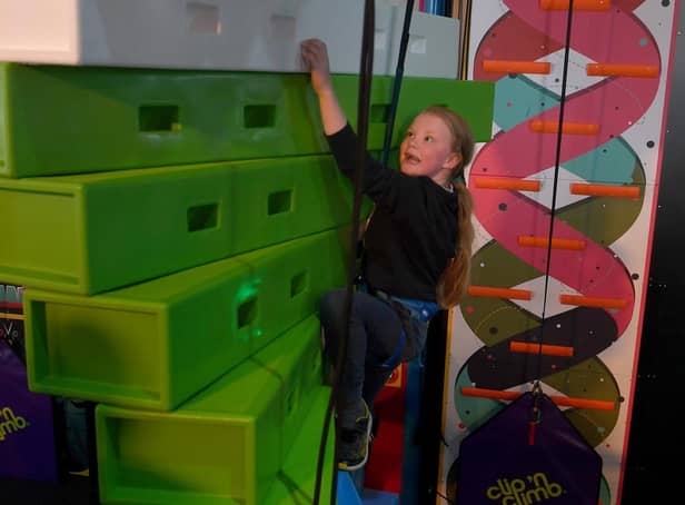 Sophia Roberts, 7, of Ingoldmells was thrilled to test out the Click 'n Climb. She used to have to travel to Lincoln for a climbing wall.