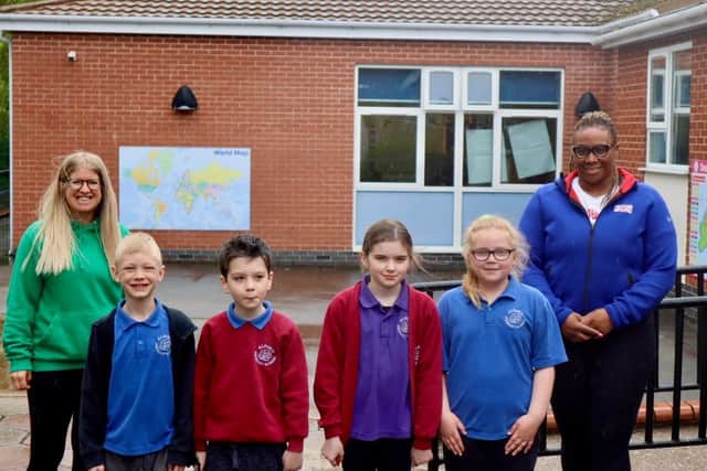 Eden Francis,  Mrs Caroline Bailey, part of the PE Team at Alford Primary School, and some of the children who took part in this exciting event.