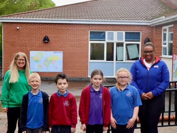 Eden Francis,  Mrs Caroline Bailey, part of the PE Team at Alford Primary School, and some of the children who took part in this exciting event.