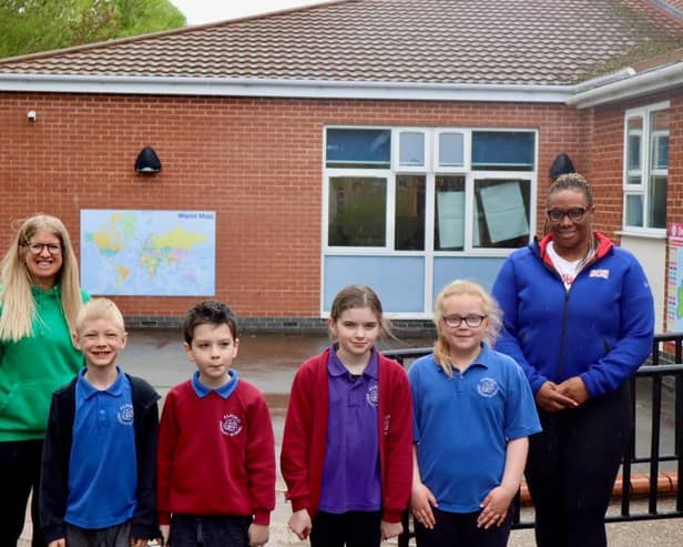 Eden Francis,  Mrs Caroline Bailey, part of the PE Team at Alford Primary School, and some of the children who took part in this exciting event.