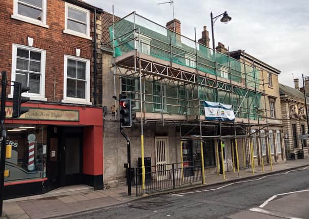 Historic shop fronts on Northgate, Sleaford, undergoing restoration last year. EMN-210525-132341001