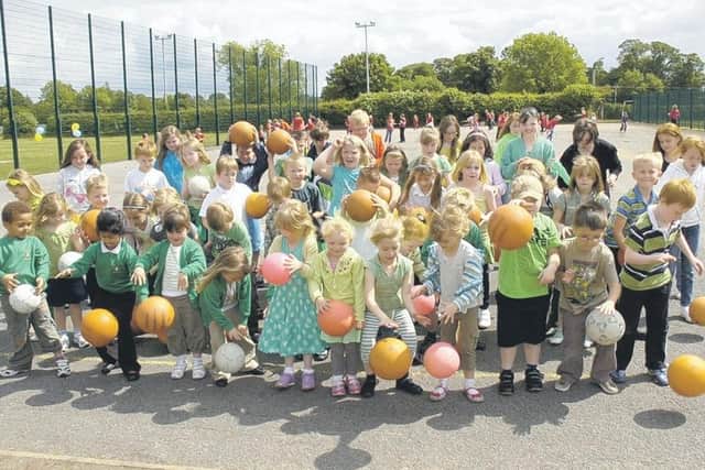 The scene at Metheringham Primary School 10 years ago during a bounce-athon fundraiser, held in support of Marie Curie Cancer Care.