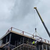 A £350,000 Lamborghini is hoisted into the new Supercar VIP Lounge at the Hive in Skegness.