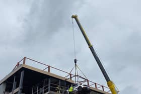 A £350,000 Lamborghini is hoisted into the new Supercar VIP Lounge at the Hive in Skegness.