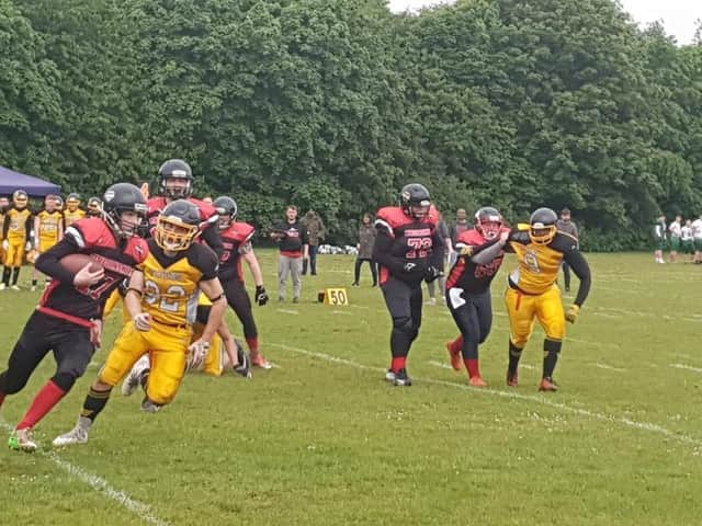 The under 19s in action.