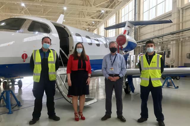 From left - Mark Damme, Affinity Driver/Handler; Dr Caroline Johnson MP; Affinity Managing Director Iain Chalmers and Sam Craft, Affinity Aircraft Technician. Photo: Affinity Flying Training Services May 2021 EMN-210528-172348001