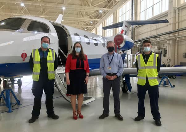 From left - Mark Damme, Affinity Driver/Handler; Dr Caroline Johnson MP; Affinity Managing Director Iain Chalmers and Sam Craft, Affinity Aircraft Technician. Photo: Affinity Flying Training Services May 2021 EMN-210528-172348001