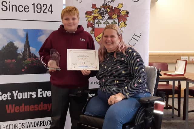 Carer of the Year Leo Ridley with mum Karen Cooper. EMN-210528-154426001