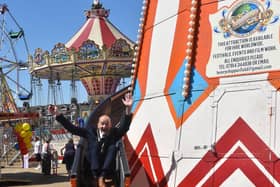 Having the time of his life... Mayor Coun Trevor Burnham on the Helter Skelter.