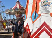 Having the time of his life... Mayor Coun Trevor Burnham on the Helter Skelter.