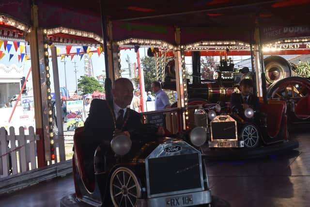 Mayor of Skegness Coun Trevor Burnham on the dodgems, closely followed by Deputy Mayor Billy Brookes. Photo: Barry Robinson