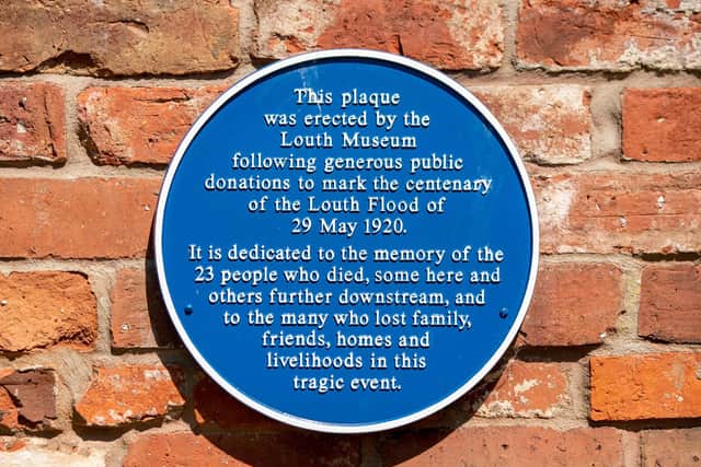 The commemorative plaque in Spout Yard Park.