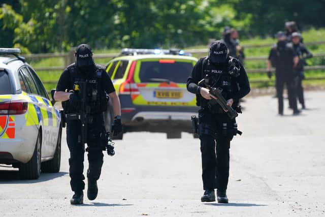 Armed police at Hallington House Farm on the outskirts of Louth, Lincolnshire.