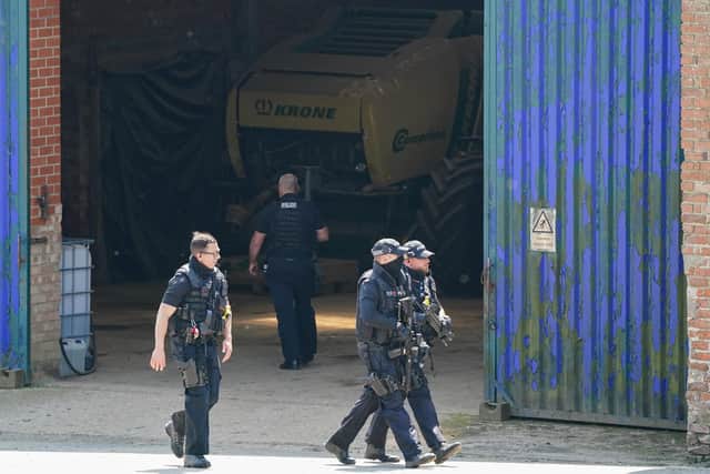 Armed police at Hallington House Farm on the outskirts of Louth.