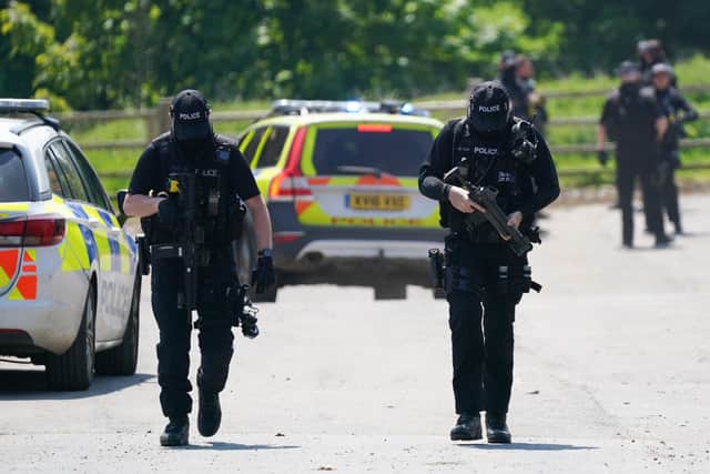 Armed police at Hallington House Farm on the outskirts of Louth, Lincolnshire, after a man was detained by officers hunting for Daniel Boulton. Picture date: Tuesday June 1, 2021.
