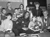 Boston’s Gladiator champions Mark Everitt pictured with mayor Coun Albert Tebbs and children at Focus One Youth Centre.