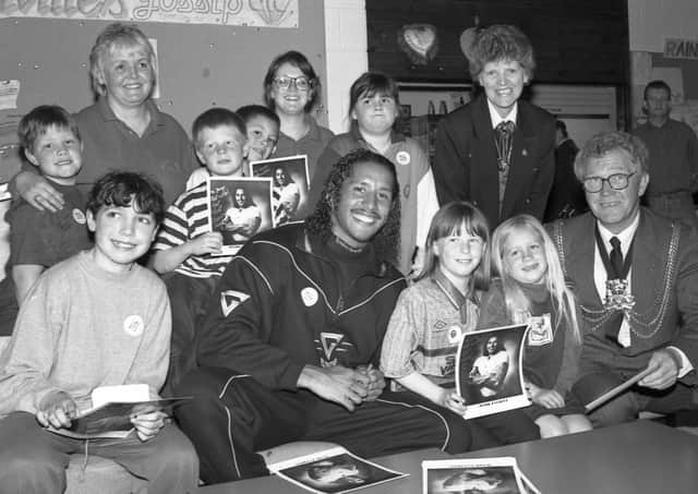 Boston’s Gladiator champions Mark Everitt pictured with mayor Coun Albert Tebbs and children at Focus One Youth Centre.