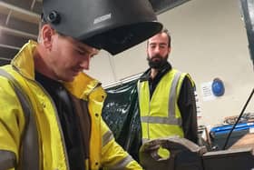 Stephen Spence, an engineering apprentice at Moy Park, supervised by Moy Park trainer, Jason Craig.