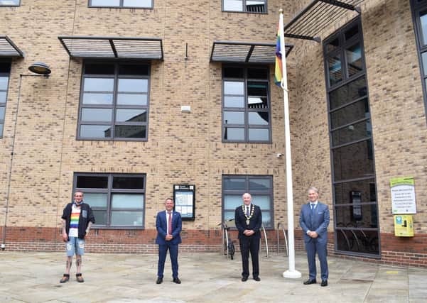 From left:  Simon Hedison (member of the Gainsborough LGBT group), Gainsborough Town Councillor Baptiste Velan, Chairman of West Lindsey District Council Councillor Steve England and Chief Executive of WLDC, Ian Knowles.