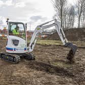 The Volvo electric excavator on site at Holdingham Roundabout. EMN-210706-144444001